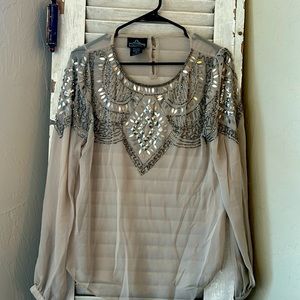 Angie beige dressy blouse with silver detailing on neckline